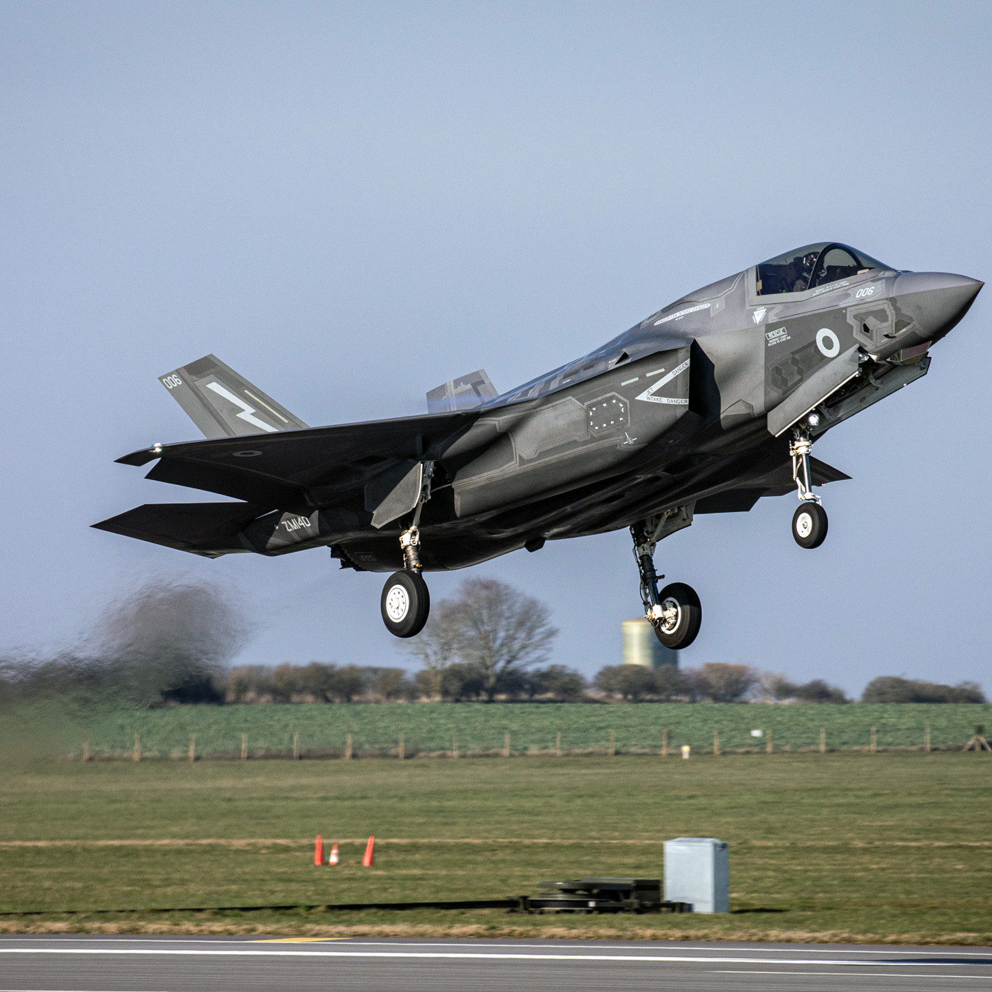 Defence aircraft taking off from runway