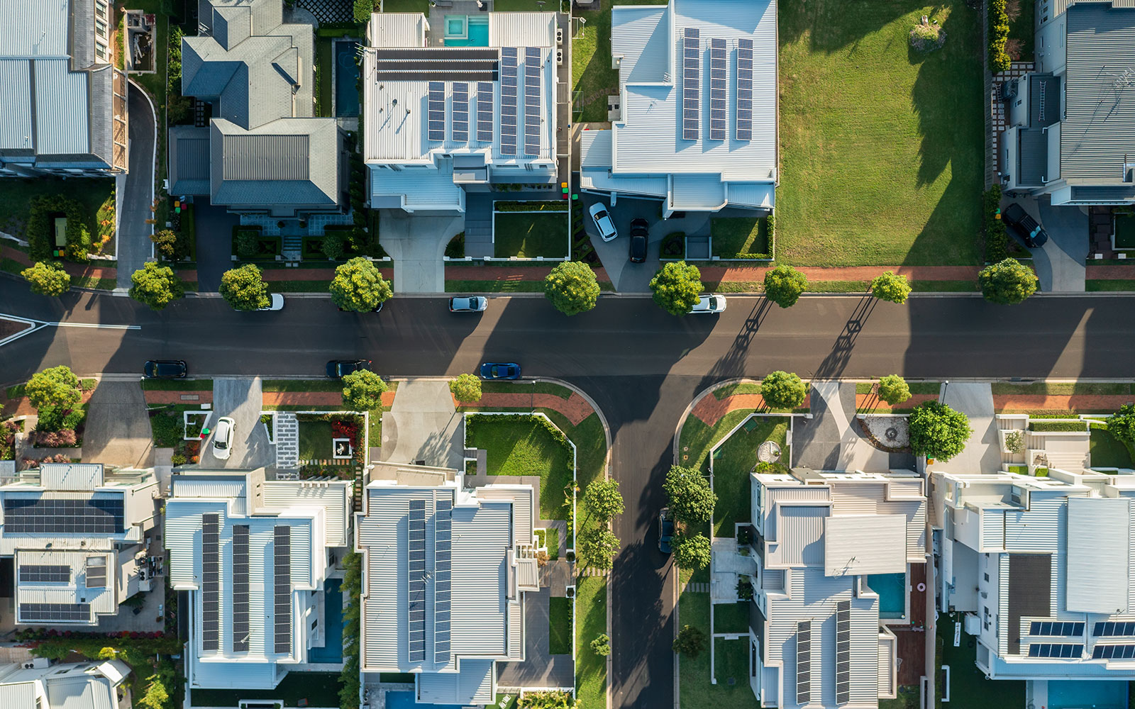 Aerial view of solar panels on rooftops 