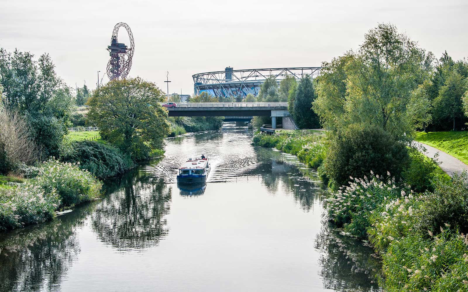 River running through Queen Elizabeth Olympic Park in London, UK