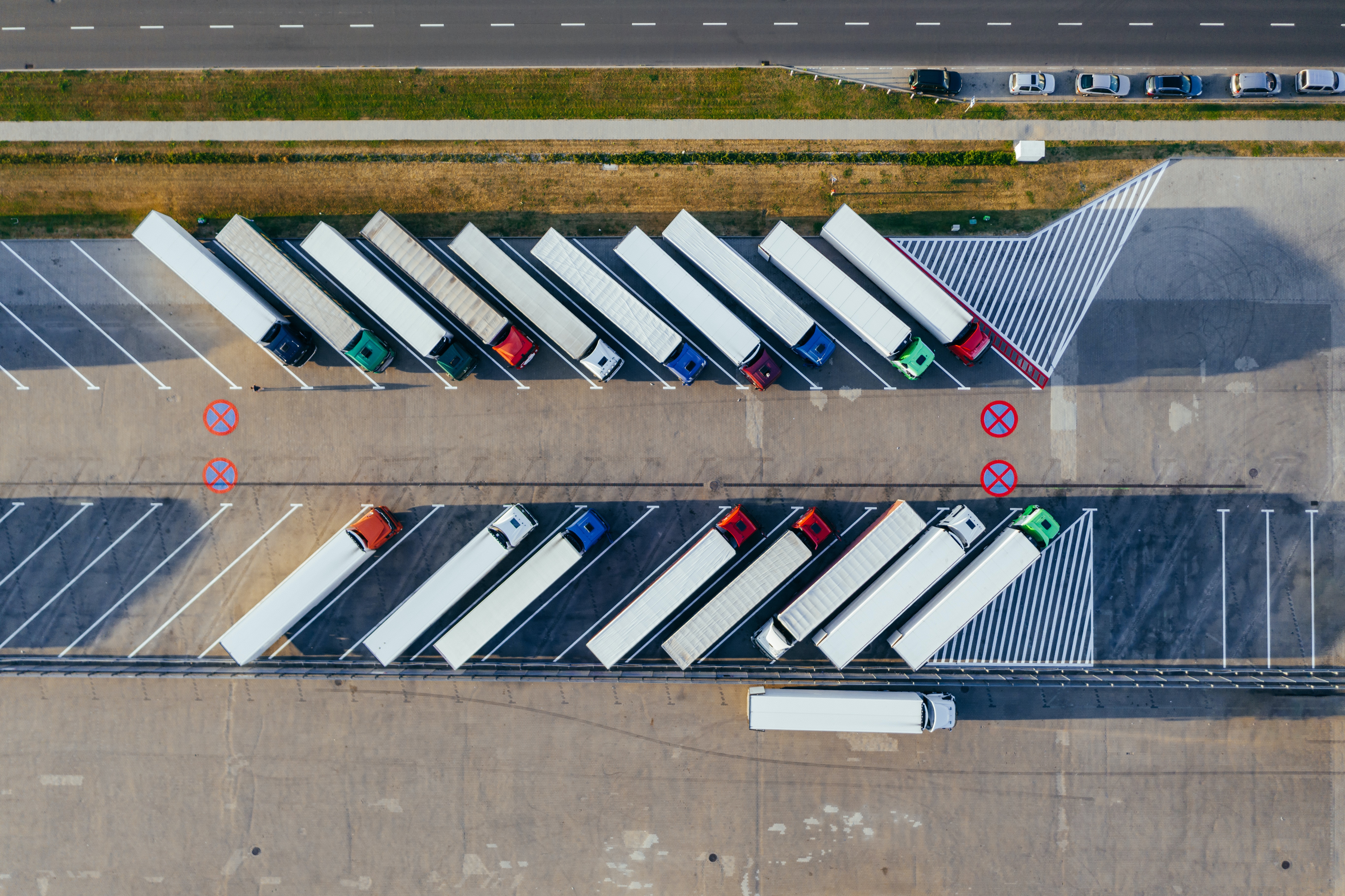 Birdseye view of trucks in a car park