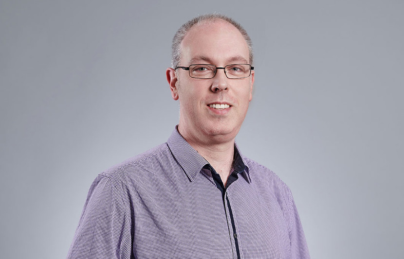 David Wright, RPS Practice Leader - Ocean Science & Technology.
Corporate headshot - David smiles at the camera wearing light purple check shirt.
