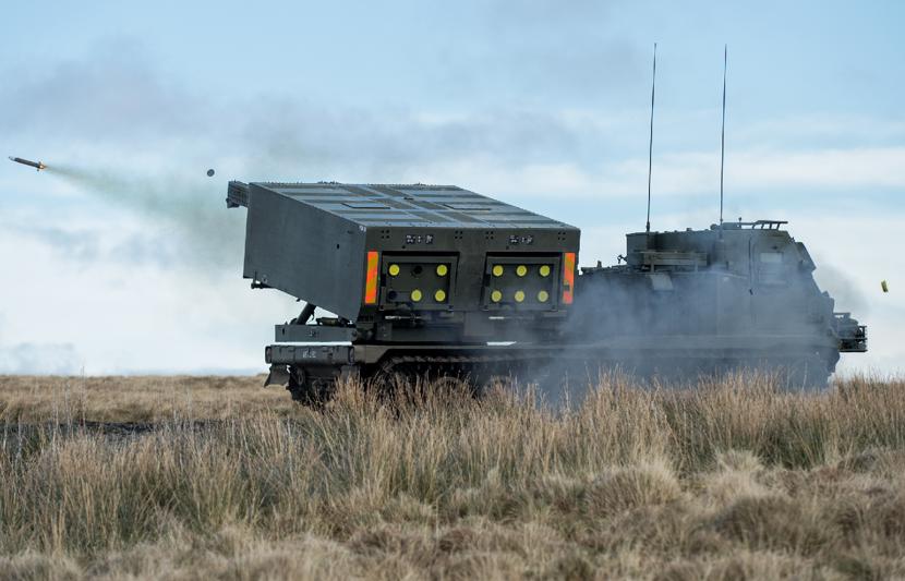Artillery tank in field action.