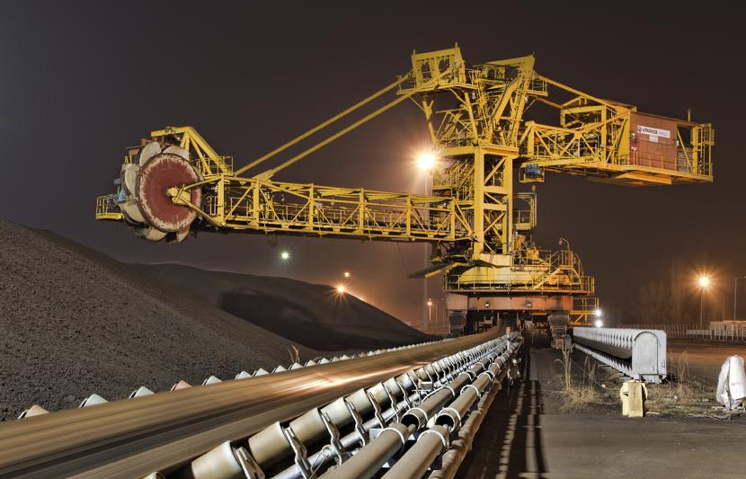 Cranes at work in a power station facility.