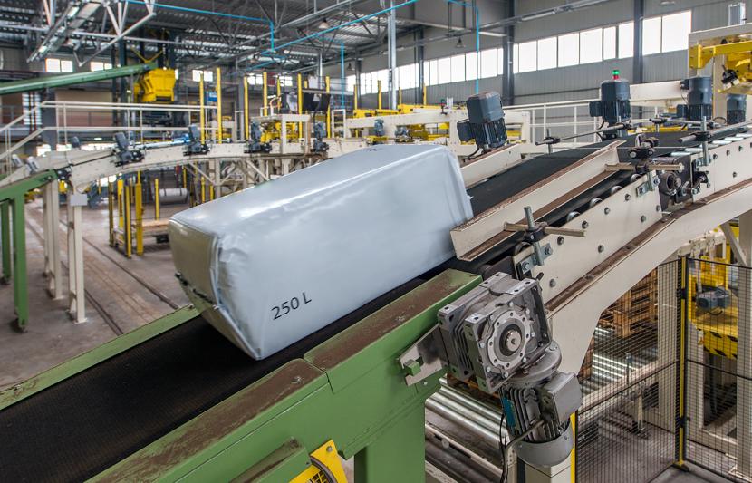 A conveyor belt inside a peat extraction, waste processing and composting facility.