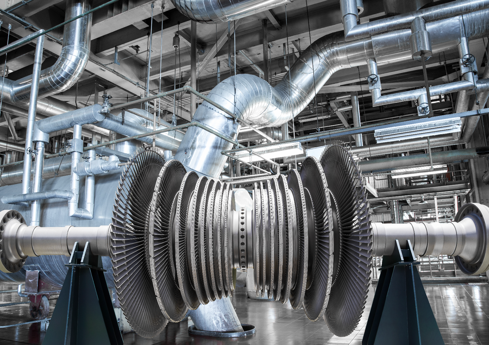 Metal pipework inside a power station facility.