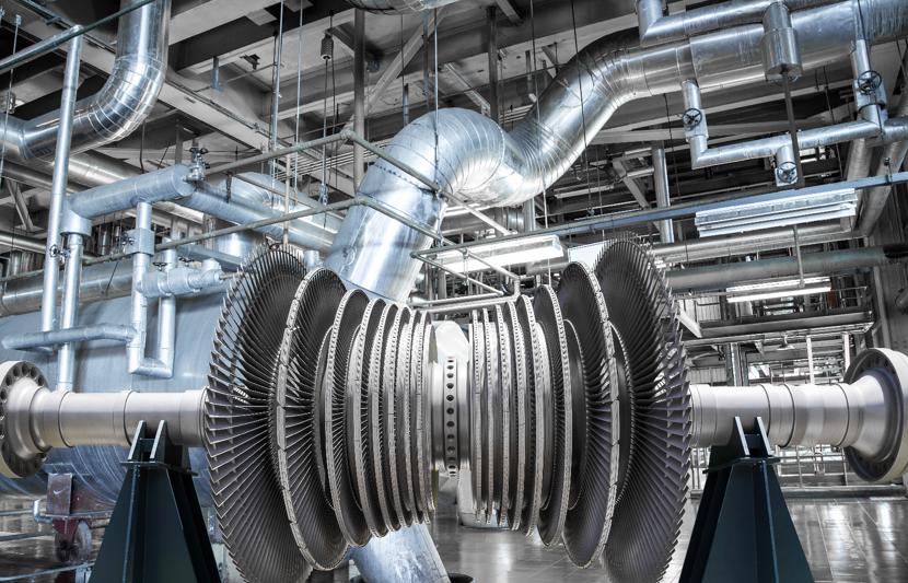 Metal pipework inside a power station facility.