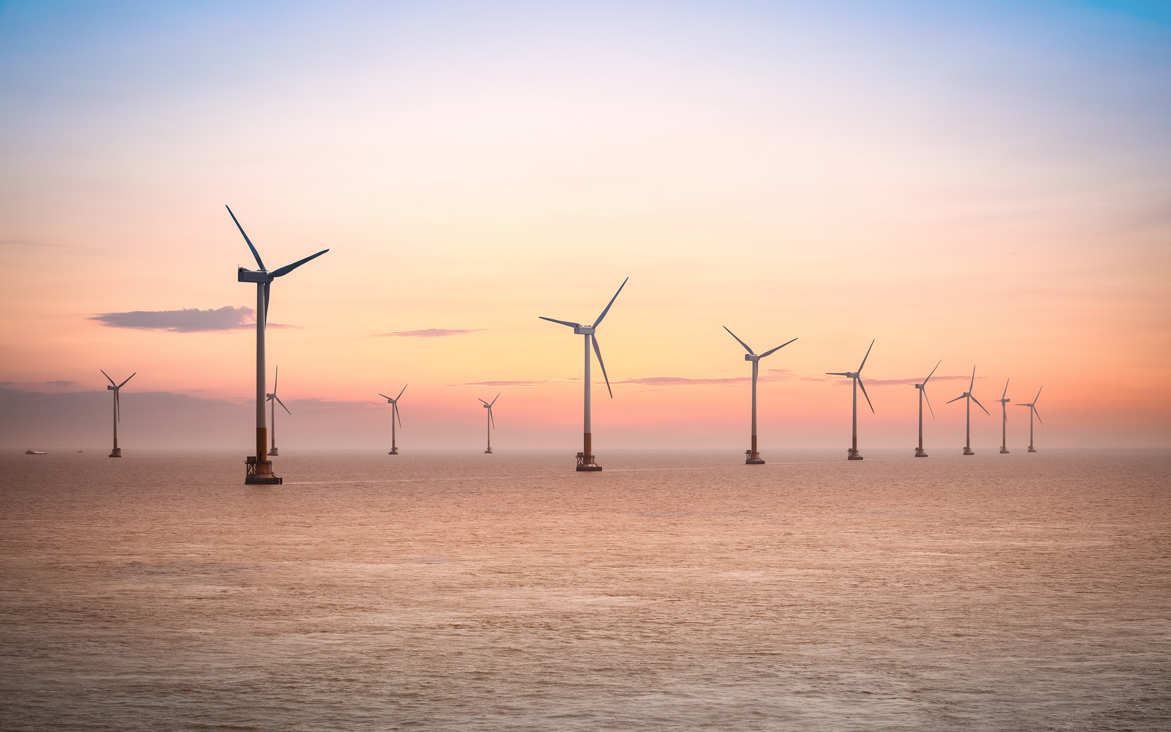 Offshore wind farm at sunset