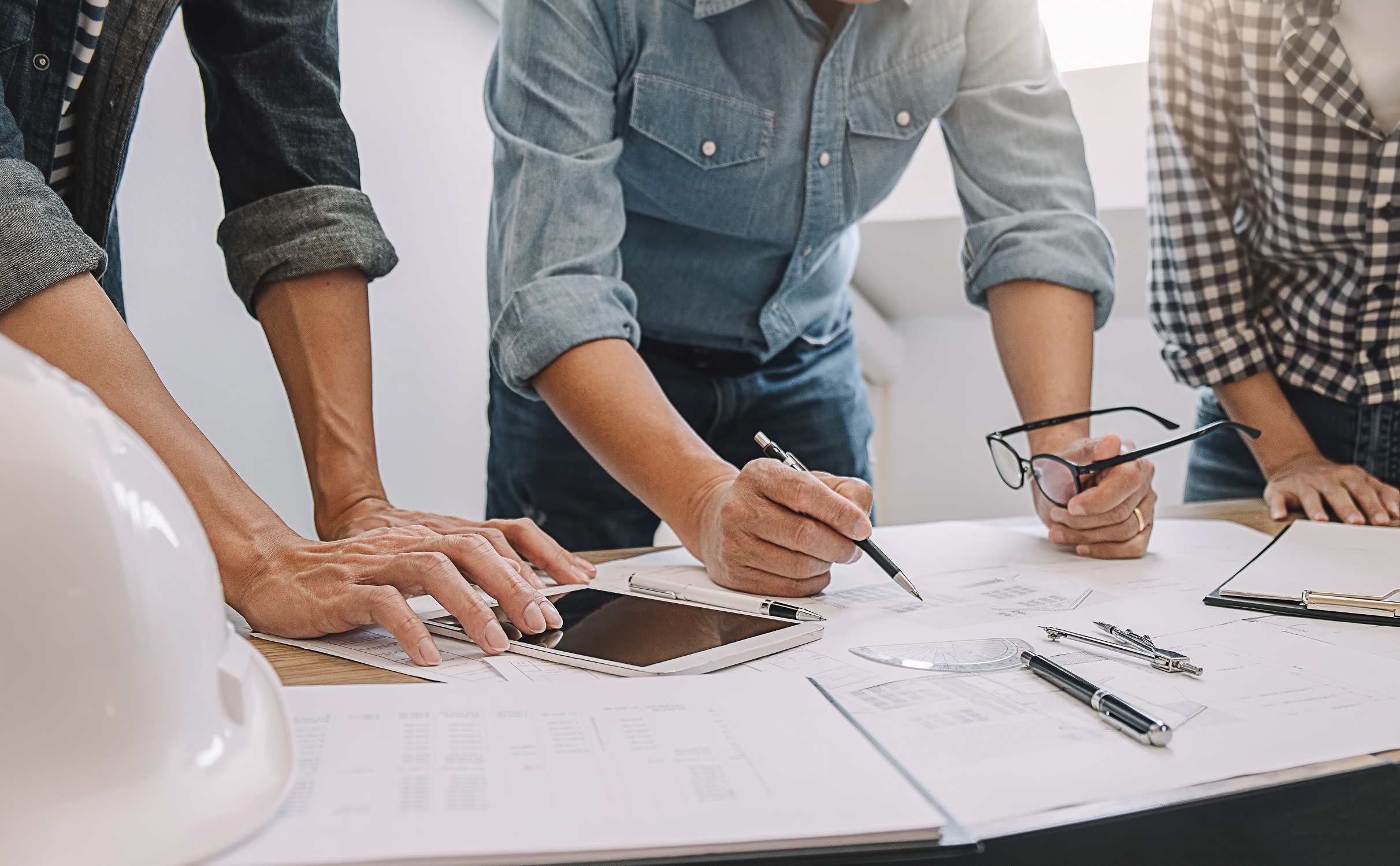 Project managers review a plan