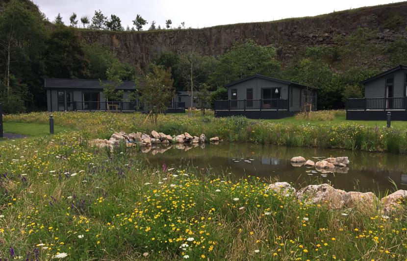 View of the redeveloped Rivendale Holiday Park with grasslands and ponds