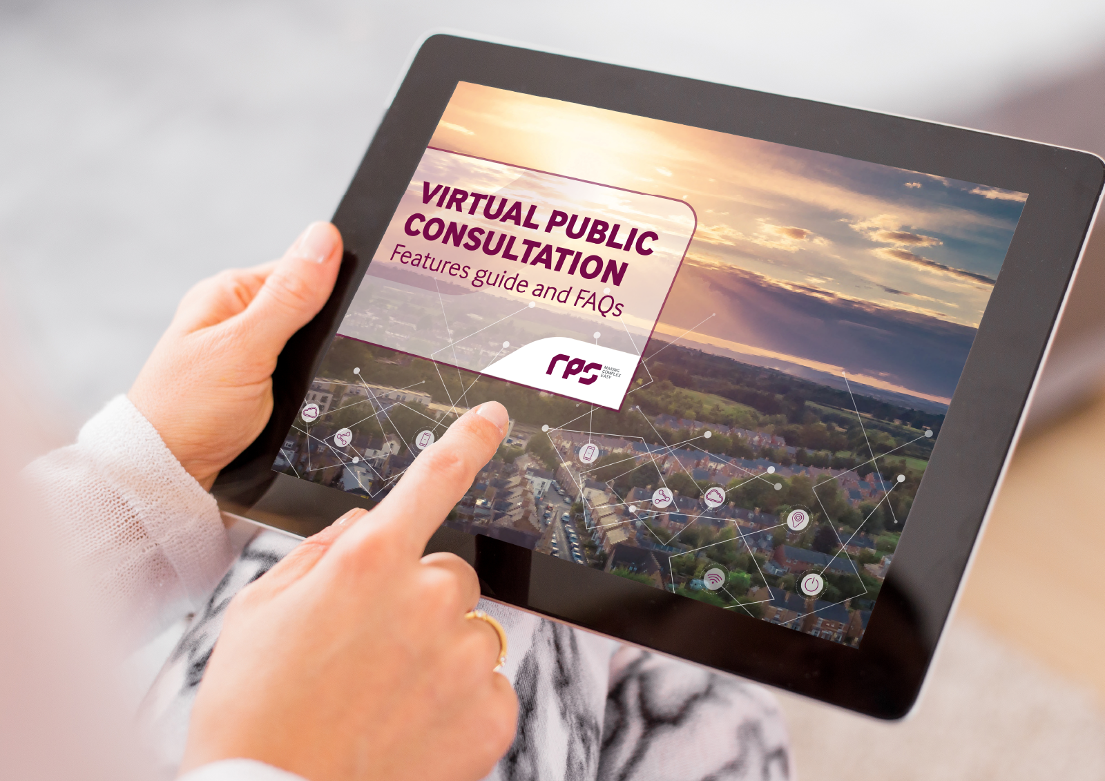 Ipad showing the virtual consultation features and FAQ guide on screen