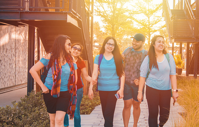 Family walking through residential area.