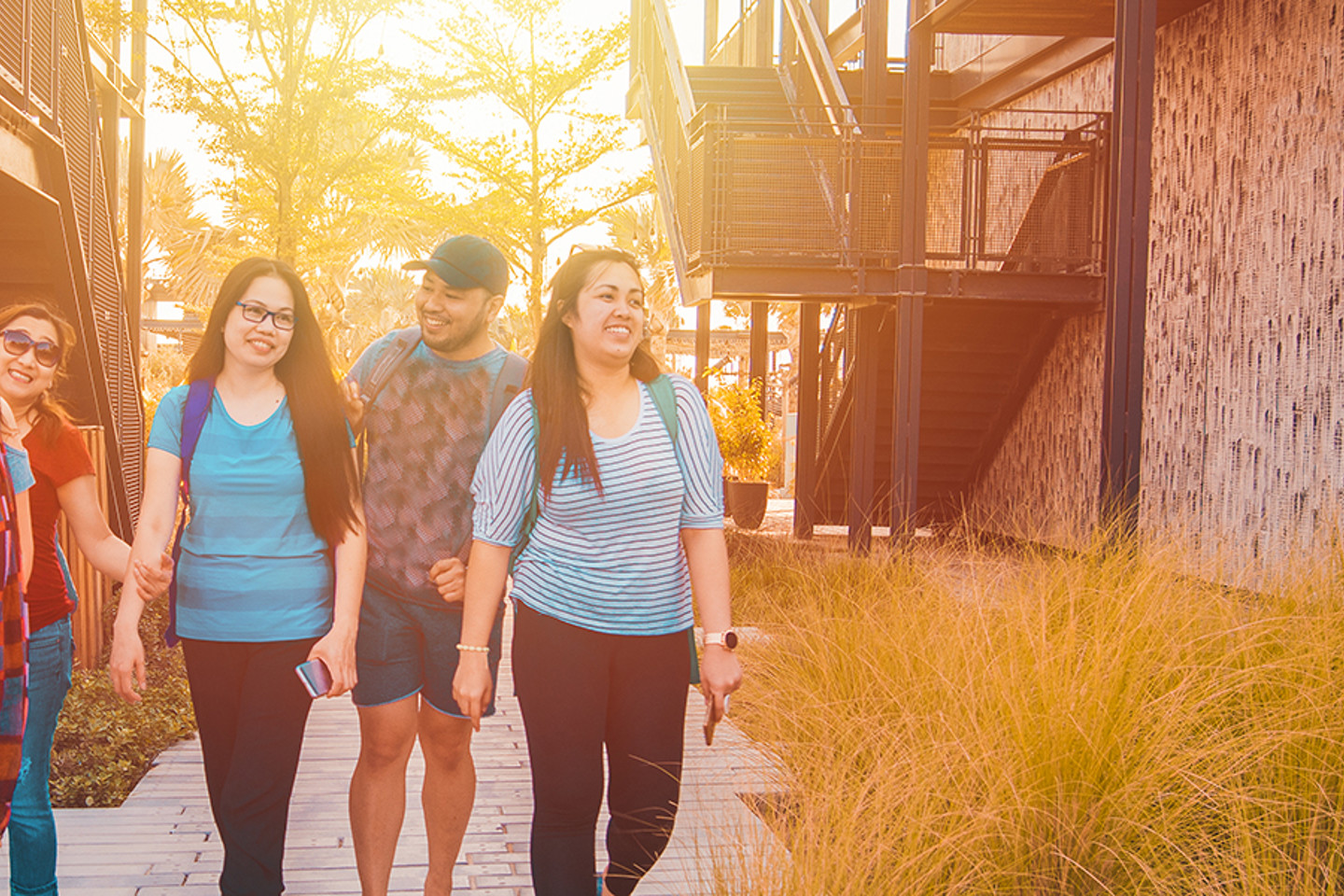 Family walking through residential area.
