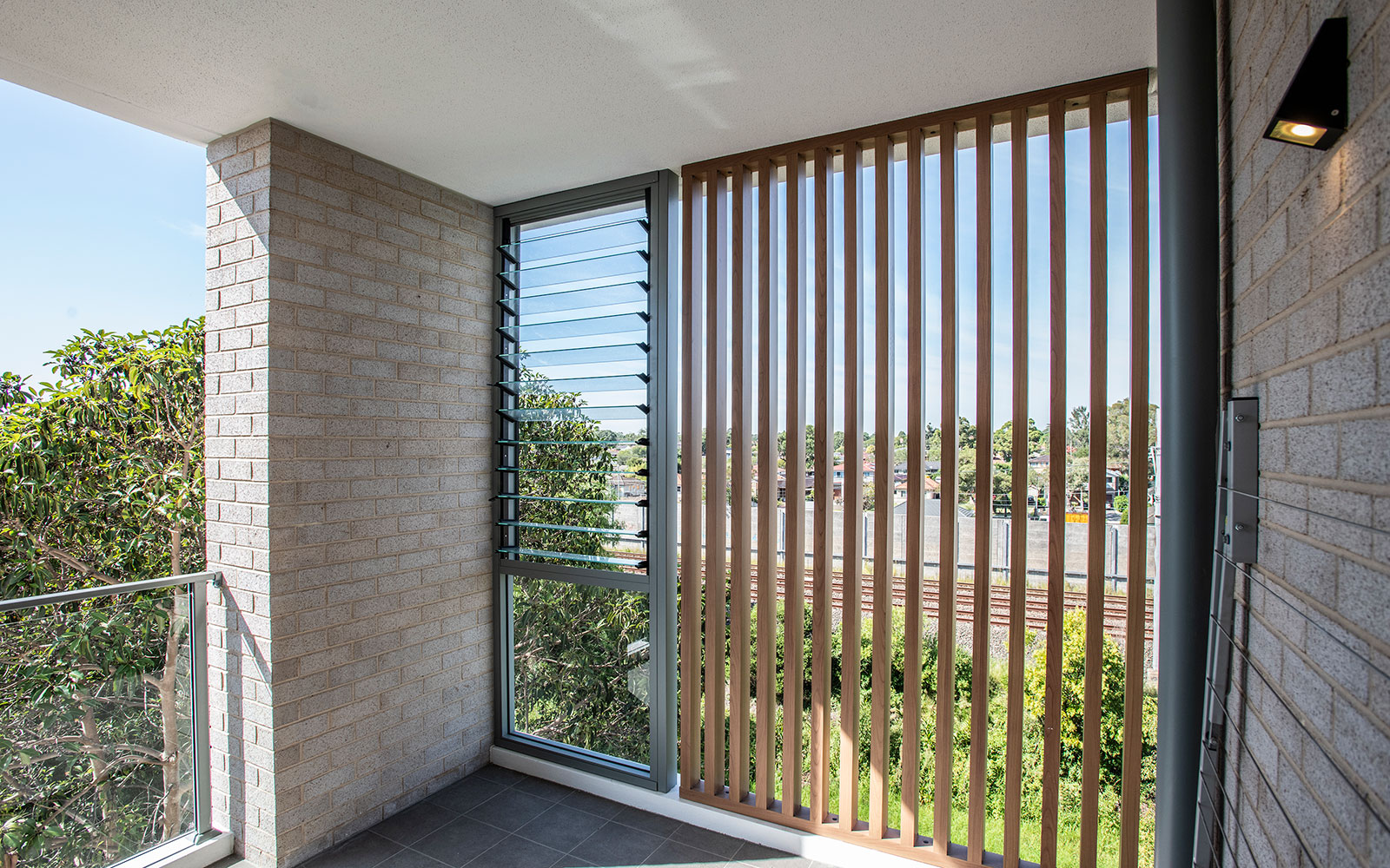 Screened balcony at Waldron Rd Chester Hill social housing project. Image credit: Homes NSW