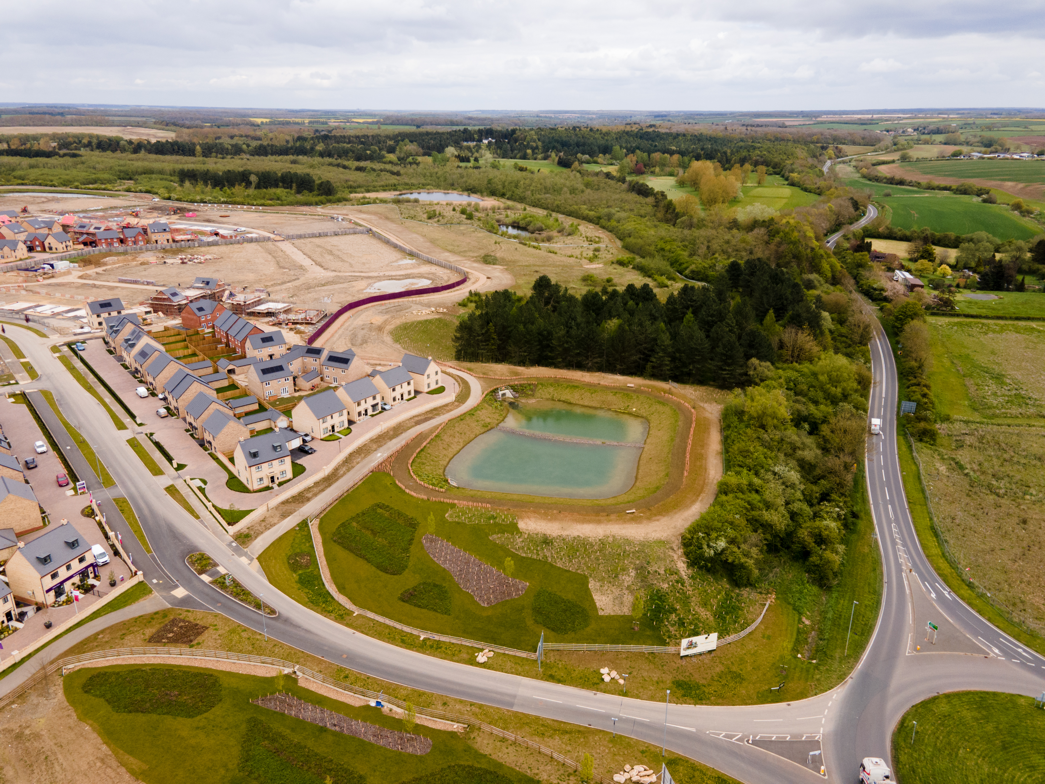 Aerial view of a residental-led development on greenland and brownfield site