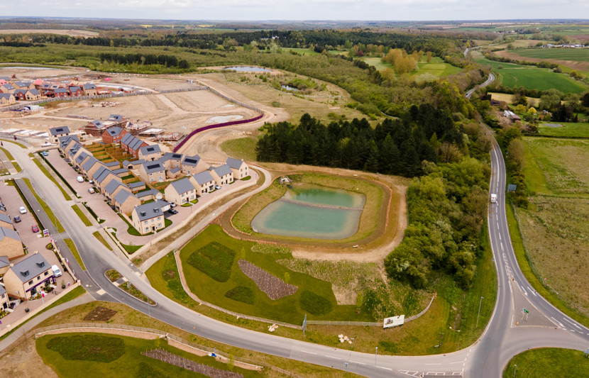 Aerial view of a residental-led development on greenland and brownfield site