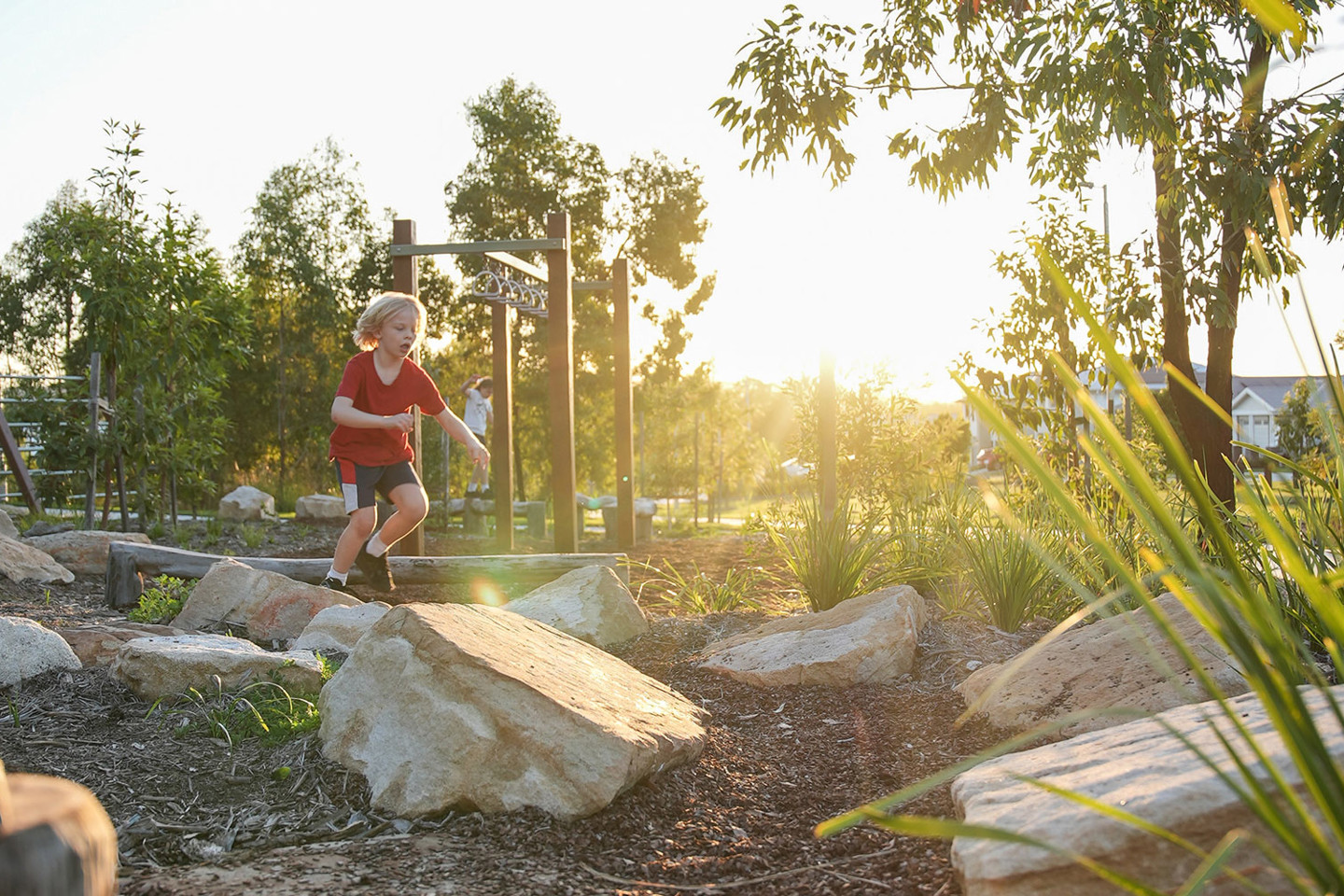 Boy plays in Yarrabilba - Borrol Lookout Park